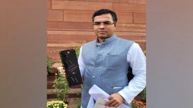 India News | Delhi BJP MP Shows Up in Parliament with Liquor, Says Kejriwal Govt Encouraging Consumption