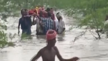 India News | Virudhanagar: Villagers Carry Body of Person Through Flooded River