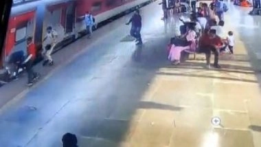 India News | RPF Personnel Saves Woman from Falling into Gap Between Platform, Train in Panvel