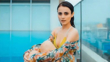 Radhika Madan Is a Total ‘Pataakha’ As She Poses in a Yellow Bikini by the Pool (View Pic)
