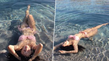 Disha Patani Poses in Water as She Flaunts Her Sexy Figure in a Pink Bikini! (View Pics)