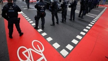 World News | Tens of Thousands Hold Rival Vaccine Protests Across Germany