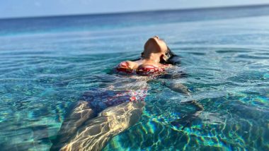 Malavika Mohanan Floats Like A Mermaid In A Red Bikini, Shares A Sexy Snap From Her Maldives Vacay!