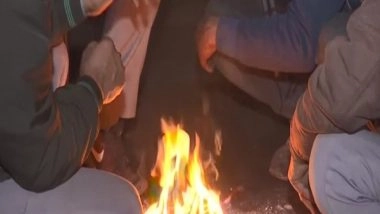 India News | People in Delhi, UP Brave Bone-chilling Cold Wave