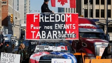 World News | Protesters Continue Blocking Canada-US Border Bridge as Injunction Enters into Force