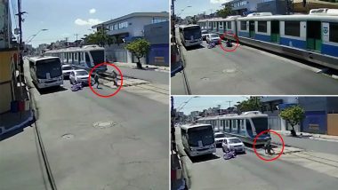 Brave Brazilian Biker Risks His Life And Saves Old Woman From Being Hit By a Tram; Watch Incredible Video