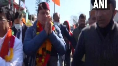 India News | U'khand Polls: Pushkar Singh Dhami Holds Door-to-door Campaign, Demands Centre for Trains from Tanakpur to Ayodhya