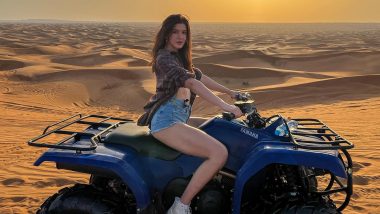 Shanaya Kapoor Dishes Out Travel Goals As She Poses on a Dirt Bike in Blue Denim Shorts and Oversized Check Shirt (View Pics)