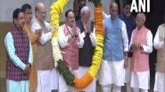 India News | PM Modi Gets Nadda Garlanded First at Parliamentary Party Meeting, Shows Organisational Supremacy