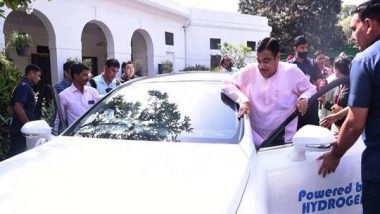 Business News | Nitin Gadkari Rides Hydrogen-powered Car to Parliament