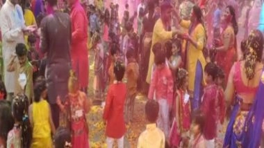 India News | Gujarat: School Children Celebrate Eco-friendly Holi with Wasted Flowers of Temple