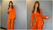 Lily Collins Makes a Rather Fun, Chic and Fabulous Style Statement in Her Bright Orange Pantsuit