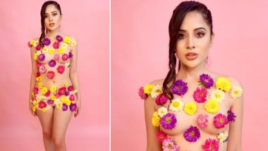 Flower Power! Urfi Javed Leaves Little to Imagination in Barely-There Transparent Dress and Strategically Placed Flowers (Watch Video)