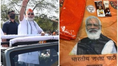 India News | Gujarat BJP Distributes Saffron Cap to Party MPs in Delhi, PM Modi Sported It in Ahmedabad