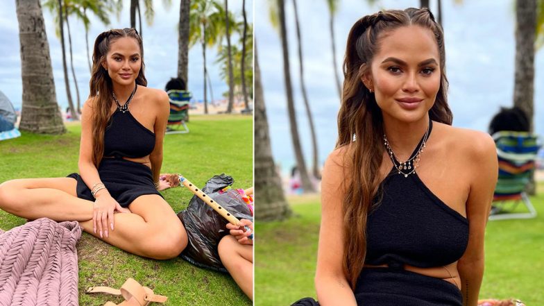 Chrissy Teigen Enjoys a Day by the Beach in a Pretty Black Crop Top and Skirt (View Pic)