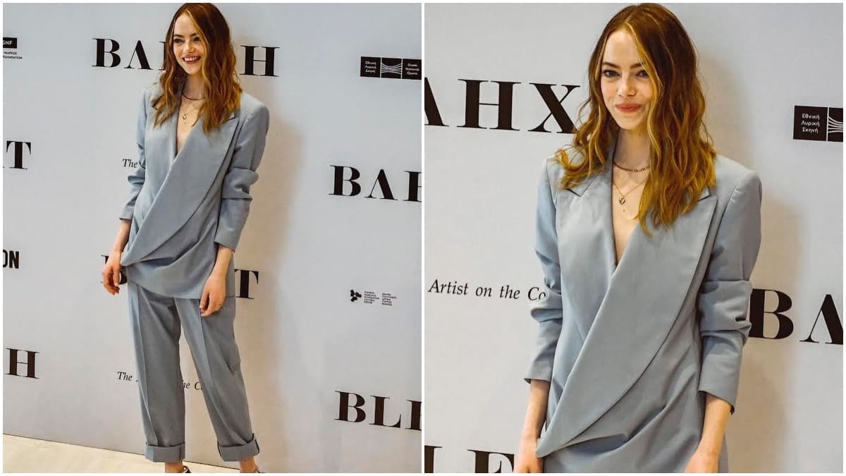 Emma Stone is the epitome of chic in a pinstripe suit at Louis Vuitton show  during PFW