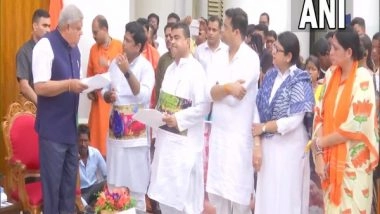 India News | BJP Delegation Meets Bengal Governor with Victim Families of Post-poll Violence