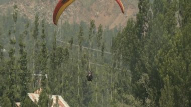 India News | J-K: Tourists, Locals Enjoy Adventure Paragliding in Srinagar