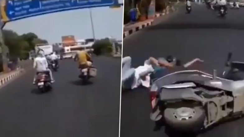 WATCH: Woman Skids & Falls on Her Own From Scooty And Blames Bike Rider Behind Her For The Accident in Viral Video