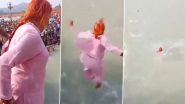 70-Year-Old Woman Takes Thrilling Dip into Ganga From Har Ki Pauri Bridge in Haridwar, Viral Stunt Video Will Make Your Heart Skip a Beat!