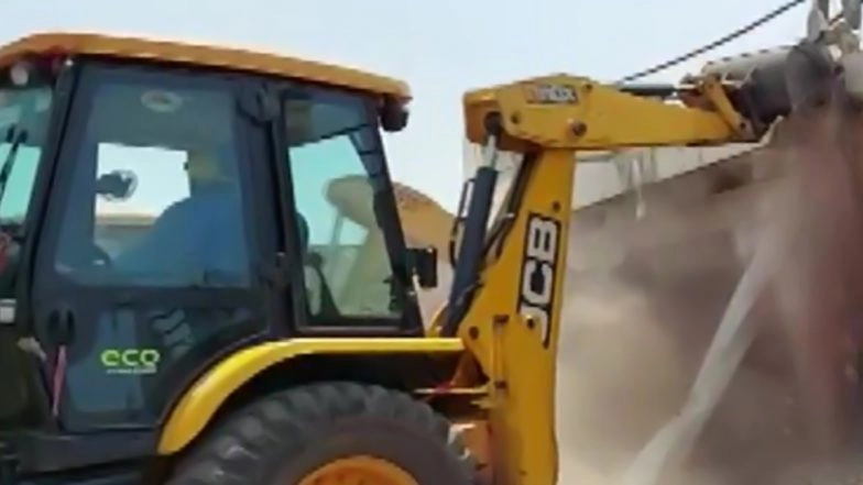 UP: Bulldozer Runs on ‘Illegal’ Shops Outside SP Office