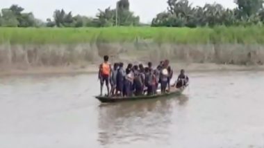 Assam: Students in Nalbari District Cross Tributary of Brahmaputra River To Reach School (Watch Video)