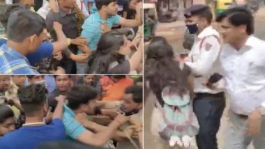 Delhi Shocker: Man, Two Girls Manhandle Cops, and Traffic Police Personnel After Being Stopped for Riding Triple Seat (Watch Video)