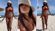 Esha Gupta Kisses the Cam as She Sizzles in a Sexy Orange Bikini (Watch Video)