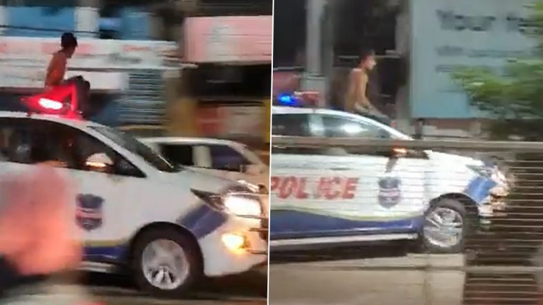 Drunk Man Creates Ruckus by Jumping Onto Moving Vehicle of Police in Hyderabad (Watch Video)