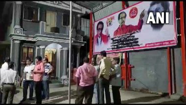 India News | Maha Political Crisis: Eknath Shinde's Supporters Blacken Posters of CM Uddhav Thackeray in Thane