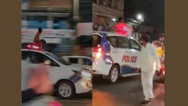 Hyderabad: Drunk Man Climbs on Moving Police Vehicle, Created Ruckus in Asif Nagar (Watch Video)