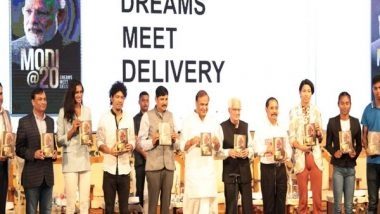India News | Assam CM Launches Book Titled 'Modi@20: Dreams Meeting Delivery'