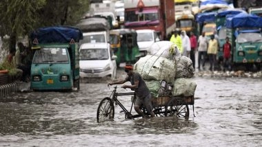 India News | Heavy Rain Lashes Delhi-NCR, Brings Respite from Sweltering Heat, Disrupts Traffic