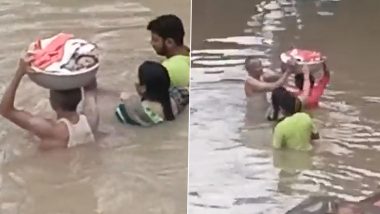 Telangana Floods: Video of 3-Month-Old Baby Being Carried in Basket in Manthani Town Reminds Netizens of Baahubali Movie Scene