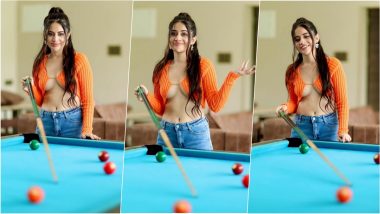 Urfi Javed Flashes Underboobs and Midriff in Orange Top and Denim While Displaying Dismal Pool Playing Skills!