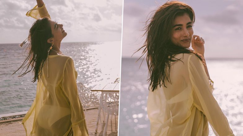 Pooja Hegde Looks Smokin’ Hot As She Serves Major Beach Style Goals In Bikini And See-Through Shirt (View Pics)