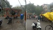 Unique Baraat Procession Show People Cover Themselves in Tarpaulin Amidst Heavy Rains in Indore, Viral Video Leave Netizens Dumbfounded