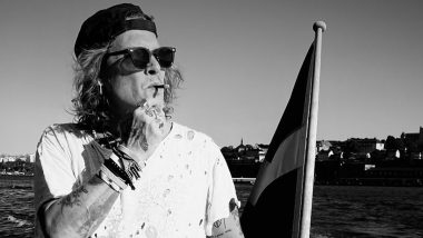 Johnny Depp Stylishly Enjoys His Boat Ride And Says ‘A Little Lull In Stockholm Between Shows’ (View Pic)
