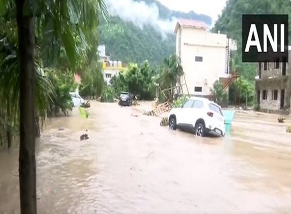 India News | U'khand Cloudburst Aftermath: Heavy Water Flow Damages Roads in Dehradun