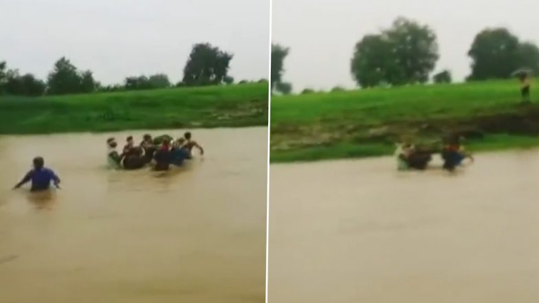 Madhya Pradesh: Villagers Carry Pregnant Woman on Cot, Risk Life by Crossing River To Take Her to Hospital in Shahpur Town (Watch Video)