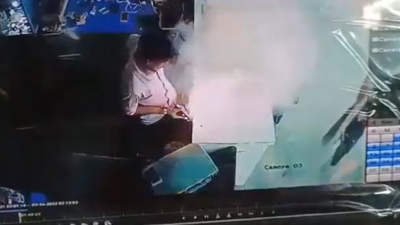 Mobile Blast Caught On Camera: Shopkeeper, Customer Escape Unhurt After Phone Battery Explodes in Madhya Pradesh's Balaghat