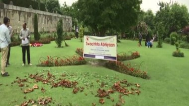 India News | School Girls Take Part in Cleaning Drive at Mughal Gardens in J-K's Srinagar