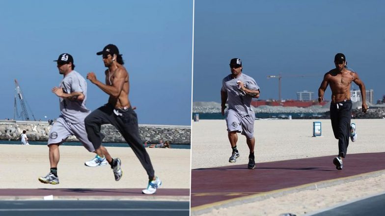 Hrithik Roshan Goes Shirtless as He Runs on the Beach! Greek God’s Ripped Physique Is Sure to Set Major Fitness Goals (View Pics)