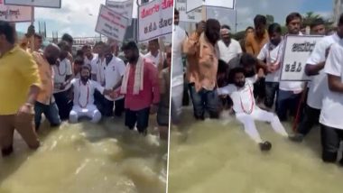 Bengaluru Rains: Congress Youth Leader Mohammed Haris Nalapad Floats Using Inflated Rubber Tube on Waterlogged Road to Protest Against Karnataka Govt (Watch Video)