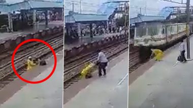 Uttar Pradesh: RPF Jawan Saves Woman From Getting Crushed Under Wheels of Speeding Train in Firozabad (Watch Video)