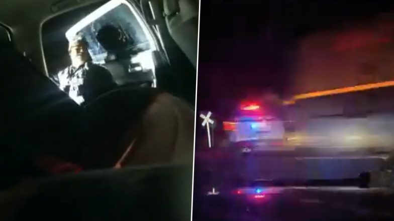 US Shocker: Colorado Cop Puts Woman Suspect in Patrol Car Parked on Railway Crossing (Watch Video)