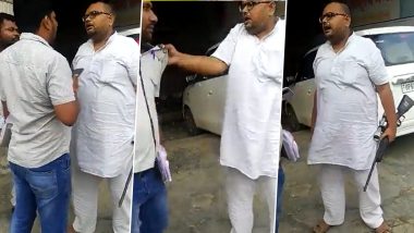 Video: Businessman Brandishes Gun, Assaults Officers of Electricity Department Who Comes To Collect Light Bill in UP’s Ballia