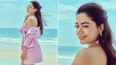 Rashmika Mandanna Winks and Poses in Cute Pink Chequered Cut-Out Dress by the Beach (View Pics)