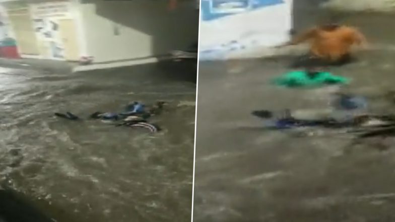 Hyderabad Rains: Man Washes Away With Bike in Flooded Street; Rescued (Watch Video)