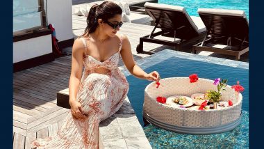 Rashmika Mandanna Gives Ultimate Beach Goals in White Cut-Out Dress As She Drops Pic From Maldives Vacation